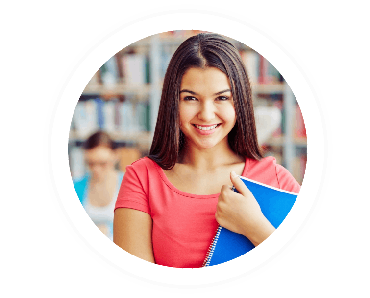 Smiling teenager with copybook looking at camera