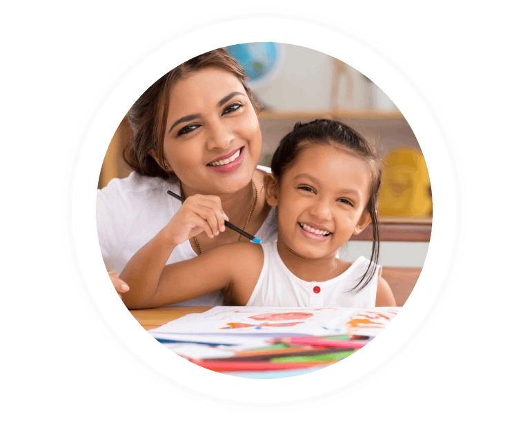 Portrait of happy mother and daughter painting with gouache